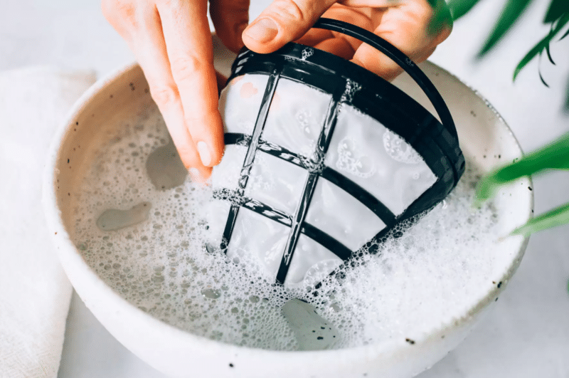 Instruction 1: Clean the brew basket and filter with dishwashing liquid daily